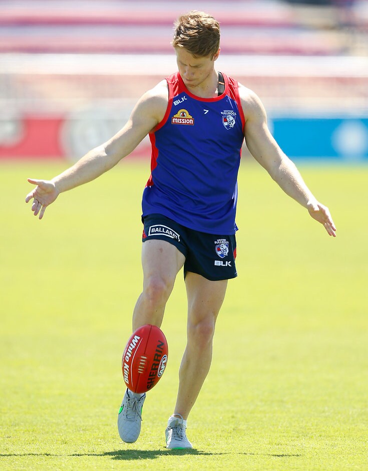AFL 2015 Training - Western Bulldogs 241115 MELBOURNE, AUSTRALIA - NOVEMBER 24: Lachie Hunter of the Bulldogs kicks the ball during the Western Bulldogs open training session at Whitten Oval, Melbourne on November 24, 2015. (Photo: Adam Trafford/AFL Media)